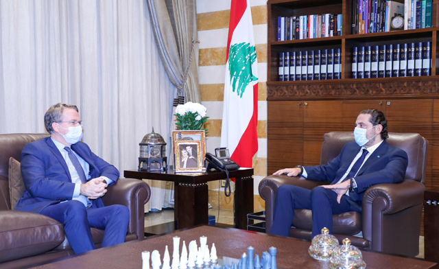 A handout photo provided by the Lebanese photo agency Dalati and Nohra on Thursday shows prime minister-designate Saad Hariri (right) meeting with Patrick Durel , an adviser to French President Emmanuel Macron, in the capital Beirut (AFP photo)