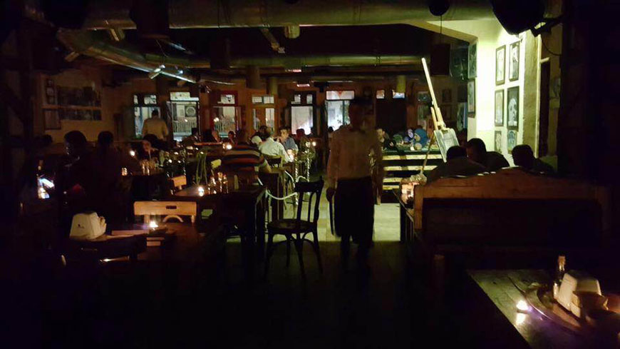 Lights are turned off at a café in Amman on Sunday night to protest the gas deal with Israel (Photo courtesy of Boycott, Divestment and Sanctions movement)