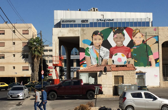 Murals are seen in Sweifieh within the ‘Open Art Museum’ project (Photo courtesy of Getty Images, FIFA and OAM)