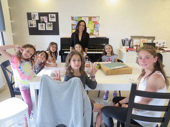 Piano teacher Dima Tahboub with some of her students recently (Photo courtesy of Dima Tahboub)