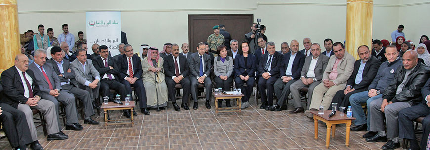 HRH Princess Basma attends a meeting held during her visit to Bani Kinanah District in Irbid, over 80km north of Amman, on Monday (Petra photo)