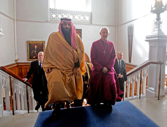 Archbishop of Canterbury Justin Welby (right) walks with Saudi Arabia's Crown Prince Mohammed Bin Salman (left) as the crown prince arrive's for a private meeting at Lambeth Palace in London, on Thursday (AFP photo)
