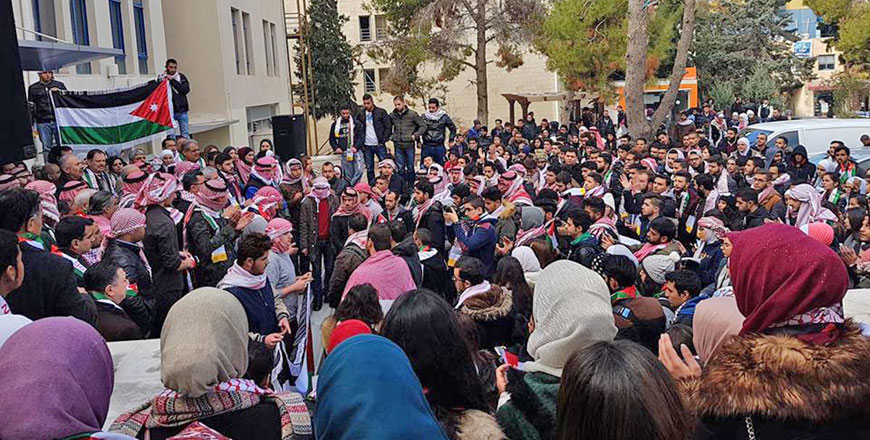 Students at the Princess Sumaya University for Technology in Amman perform prayers for the absent on campus on Monday (Petra photo)