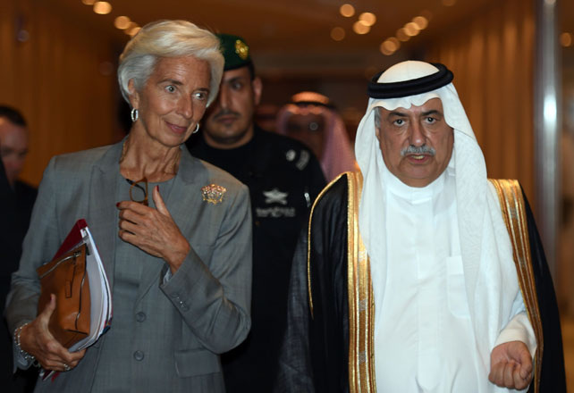 In this file photo taken on October 26, 2016, Saudi Finance Minister Ibrahim Al Assaf (right) walks alongside International Monetary Fund Managing Director Christine Lagarde in the Saudi capital Riyadh. King Salman of Saudi Arabia appointed Assaf as the new foreign minister in a government reshuffle on Thursday, a royal decree said (AFP photo)