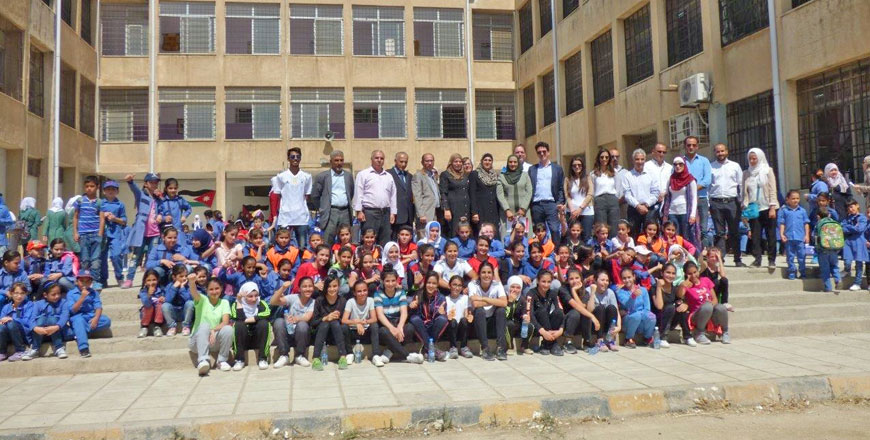 Children and staff from Al Quds Secondary School for Girls in Jabal Nuzha pose for a group photo with officials from the German Agency for International Cooperation   (Photo courtesy of the German Agency for International Cooperation)