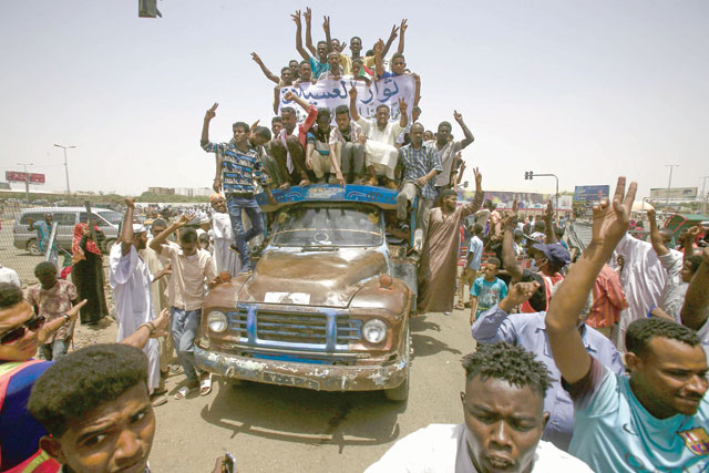 Sudanese protesters gather near the military headquarters in the capital Khartoum, during a rally on Saturday (AFP photo)