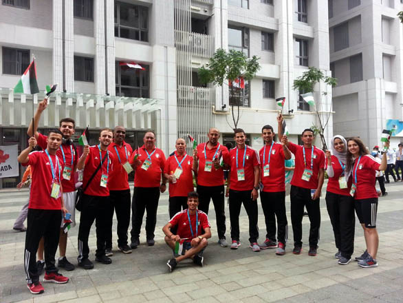 Members of the Jordanian team participating in the 29th Summer Universiade pose for a group photo in Taipei city recently (Photo by Pei-yu Lin)