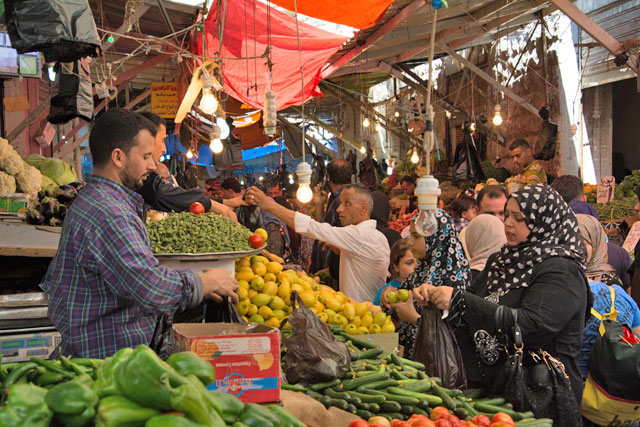 A total of 1,000 tonnes of fruit and vegetables, worth millions of Jordanian dinars, used to be exported every day to Syria and Lebanon (Photo by Amjad Ghsoun)