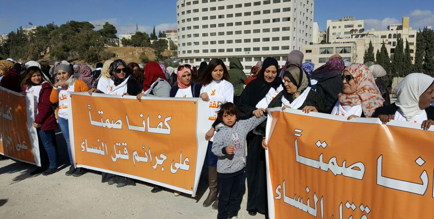 Women's rights activists picket Parliament in Abdali on Thursday to call for ending crimes against women (Photo by Rana Husseini)