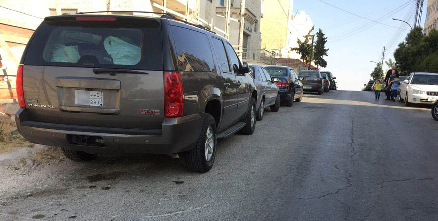 A car with a Saudi licence plate is parked on the side of a street in Amman on Wednesday. Last year, over 200,000 cars entered the Kingdom from border crossings with Saudi Arabia in the months of June and July (Photo by Omar Obeidat)