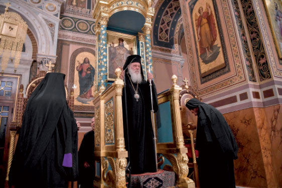 In this file photo taken on July 24 the head of the Church of Greece Archbishop Ieronymos (centre) holds a special service at Athens Metropolitan Church (AFP photo)