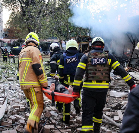 This handout photograph taken and released by Ukrainian Emergency Service on Thursday shows rescuers carrying a wounded person from a hotel in the city of Cherkasy after an overnight missile attack (AFP photo)