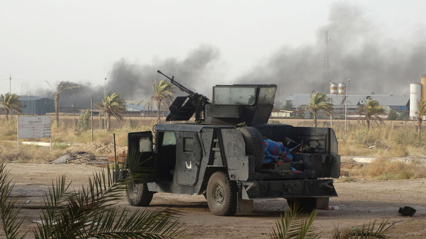 Smoke rises while Iraqi security forces backed by Shiite and Sunni pro-government fighters and US-led coalition launches air strikes against Daesh militant group positions in Anbar University in Ramadi, Anbar province, Iraq, on Sunday (AP photo)