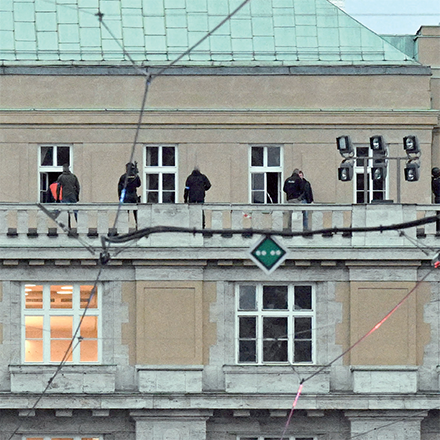 Armed police are seen on the balcony of the Charles University in central Prague, on Thursday  (AFP photo)