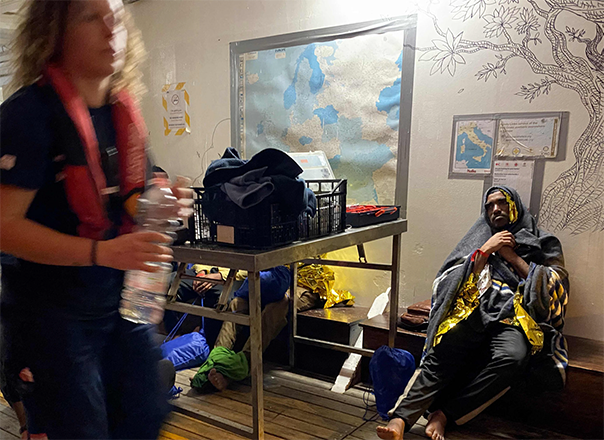 Volunteers take care of migrants onboard the Ocean Viking rescue ship of European maritime-humanitarian organisation ‘SOS Mediterranee’ following a rescue operation off Malta, early on Monday (AFP photo)