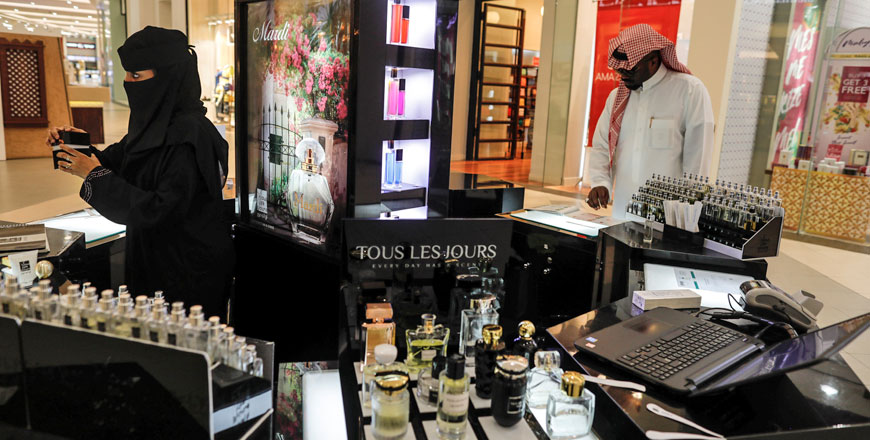 A Saudi saleswoman is pictured in her stall at a shopping mall in Jeddah, Saudi Arabia, on Monday (Reuters photo)