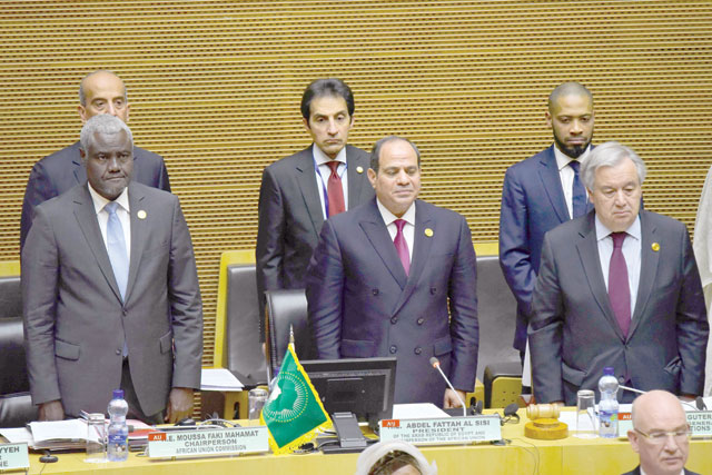 From left to right front row: Chairperson of the African Union Commission Moussa Faki Mahamat, Egyptian President Abdel Fattah Al Sisi and United Nations Secretary General Antonio Guterres observe a moment of silence for Kenya's former president, Daniel arap Moi, at the opening of the meeting of African heads of state at the African Union headquarters in Addis Ababa on Sunday (AFP photo)