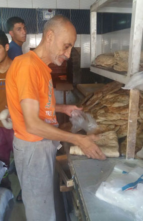 Munthir Tantawi works at his bakery in Jerash recently (Photo by Ahmed Bani Mustafa)