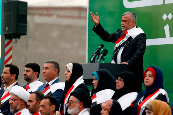 Hadi Al Ameri, head of the Badr organisation and leader of the mostly Shiite Hashed Al Shaabi paramilitary units, speaks during a campaign gathering in the city of Basra on Saturday (AFP photo)