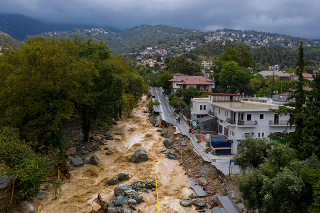 An aerial view, taken on Wednesday, shows a partially destroyed road in a flooded area in the city of Volos, central Greece (AFP photo)