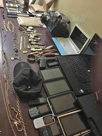 Stolen items found in the possession of suspects arrested in connection with several reported home burglaries (Photo courtesy of Public Security Department)
