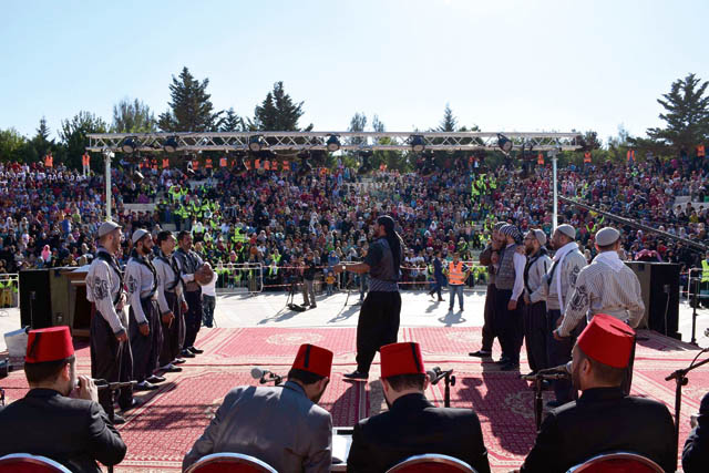A folklore troupe performs to thousands of vulnerable children and their families at an iftar meal held at King Hussein Park in Amman on Thursday (Photo courtesy of Nasmet Khair)