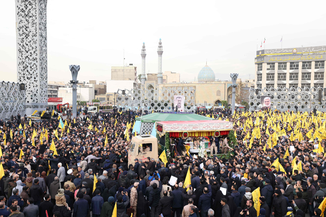 Mourners attend the funeral of Razi Moussavi, a senior commander in the Quds Force of Iran's Islamic Revolutionary Guard Corps (IRGC) who was killed on December 25 in an Israeli strike in Syria, in Tehran, on Thursday (AFP photo)