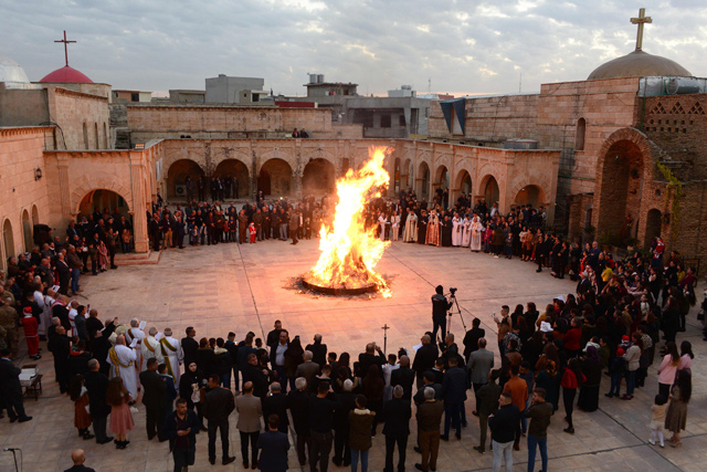 In this file photo taken on December 24, 2019, Iraqi Christians attend Christmas eve mass at the Syriac Catholic Church of the Immaculate Conception in the predominantly Iraqi Christian town of Qaraqosh, in Niniveh province some 30 kilometres from Mosul (AFP photo)