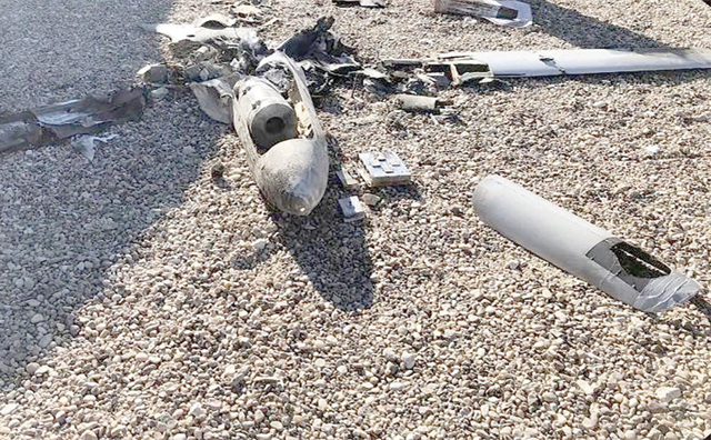 An image obtained from Iraq's official security media cell, a media department attached to the Iraqi security forces, shows the remains of one of two armed drones that targeted Ain Al Asad Air Base after they were shot down on Tuesday in western Iraq (AFP photo)