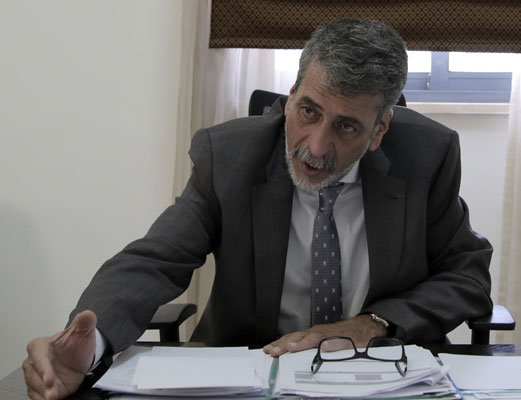 Chief Commissioner of the Independent Elections Commission Khaled Kalaldeh speaks to The Jordan Times at his office on Monday (Photo by Osama Agarbeh)