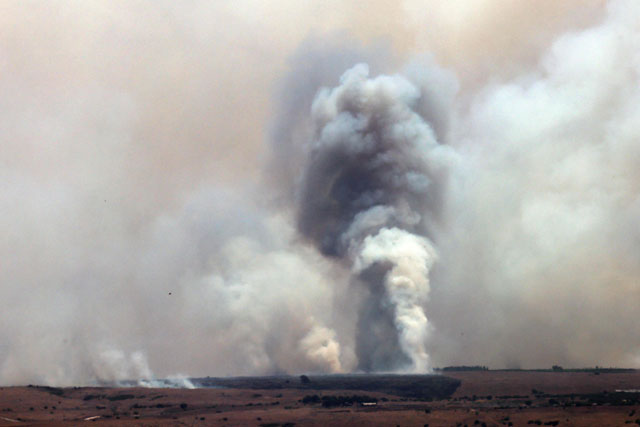 Smoke billows after a hit from a rocket fired from southern Lebanon over the Upper Galilee region in northern Israel on Thursday. Lebanon's Hizbollah said it launched more than 200 rockets and explosive drones at Israeli military positions on July 4 as tensions have soared amid the almost nine-months-old war raging in Gaza (AFP photo)