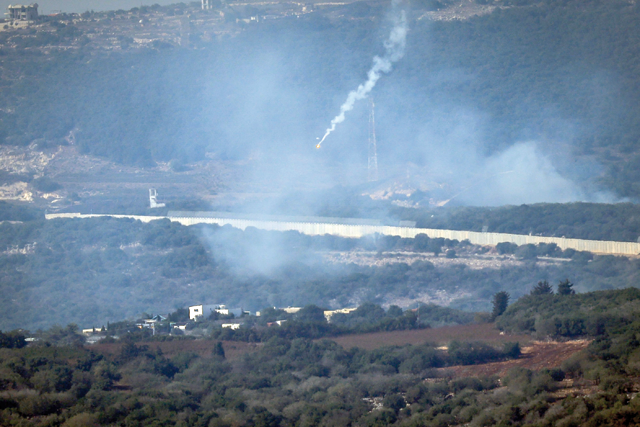 Flares are fired from northern Israel over the southern Lebanese border village of Aita Al Shaab, on Saturday, amid intensifying cross-border skirmishes (AFP photo)