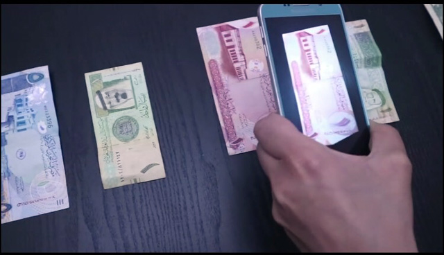 The Money Reader recognises paper currencies using the phone’s camera and transfers the results to the user via speech (Photo courtesy of Money Reader Facebook Page)