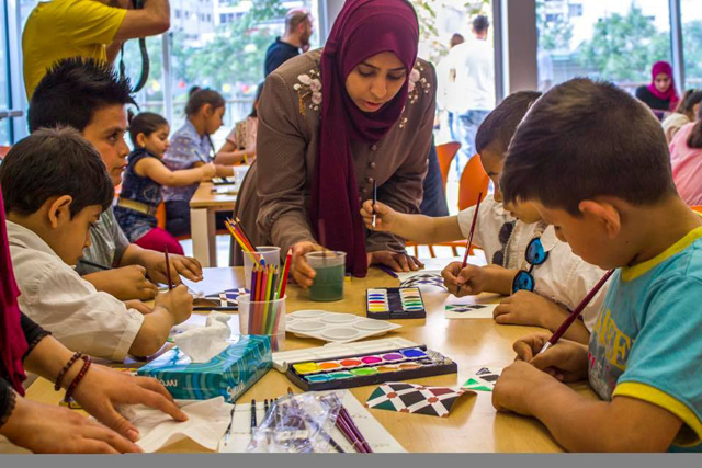 Local artists teach various art techniques to children on the occasion of World Art Day at Haya Cultural Centre on Saturday   (Photo courtesy of HCC)