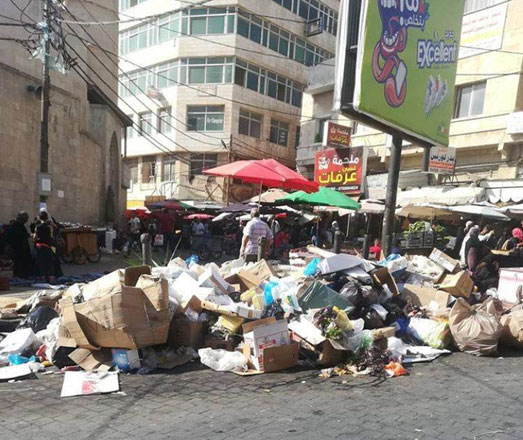 Piles of garbage are seen in Irbid on Tuesday as municipality workers have been on a strike (JT photo)