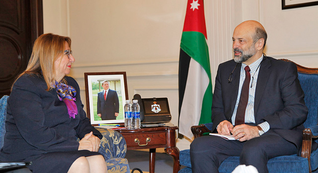 Prime Minister Omar Razzaz meets Turkish Trade Minister Ruhsar Pekcan in Amman on Monday  (Petra photo)