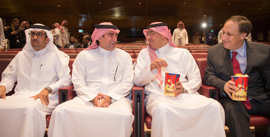 Saudi Minister of Culture and Information Awwad Al Awwad (2nd right) and Vice President of AMC Jason Cole (right) attend the opening ceremony of the AMC Entertainment Cinema in the King Abdullah Financial District, Riyadh, Saudi Arabia, on Wednesday (Anadolu Agency photo)