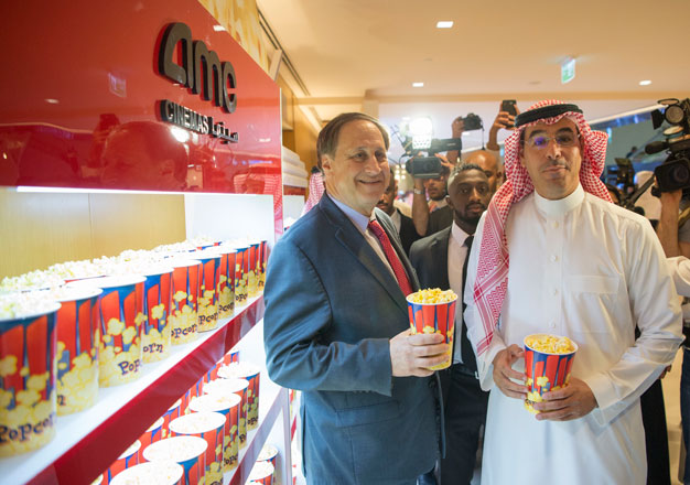 Saudi Minister of Culture and Information Awwad Alawwad (right) and Vice President of AMC Jason Cole (left) attend the opening ceremony of the AMC Entertainment Cinema in the King Abdullah Financial District, Riyadh, Saudi Arabia, on Wednesday (Anadolu Agency photo)