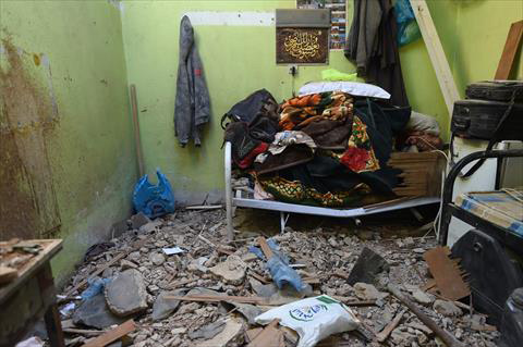 A photo taken on Monday in Um Al Hammam district in Riyadh shows damages at a home hit by falling shrapnel from Yemeni rebel missiles that were intercepted over the Saudi capital (AFP photo)