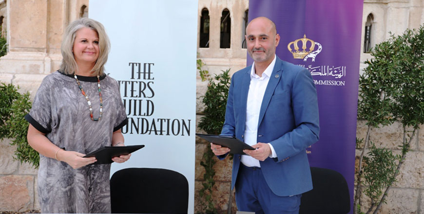 RFC Managing Director George David and Writers (right) Guild Foundation Executive Director Katie Buckland sign the MoU in Amman on Wednesday  (Photo courtesy of RFC)