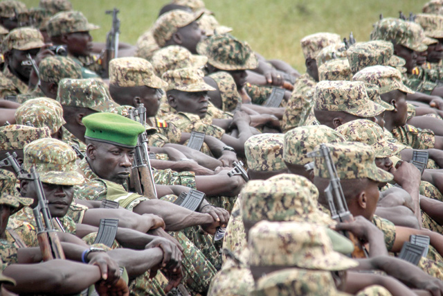 Soldiers of the Uganda People's Defence Force attend a special event before starting their service under the auspices of the African Union Mission in Somalia at the Singo military camp, 75km north of Kampala, on Thursday (AFP photo)