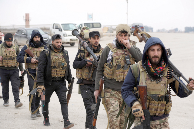 Members of the Syrian Democratic Forces are pictured in the northern Syrian city of Hasakeh on Monday (AFP photo)