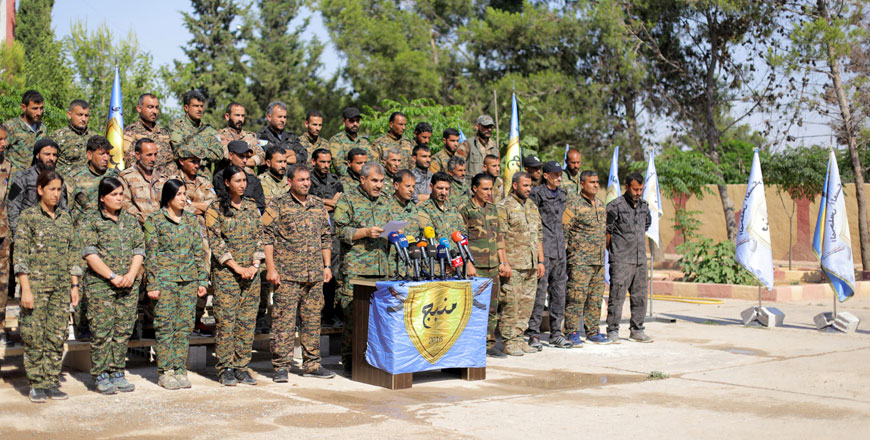 The Manbij military council members are seen during a news conference in Manbij, Syria, on June 6 (Reuters file photo)