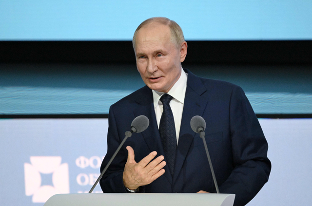 In this pool photograph distributed by the Russian state agency Sputnik, Russia's President Vladimir Putin delivers a speech at the X St. Petersburg International United Cultures Forum in Saint Petersburg on September 12, 2024 (AFP photo) 