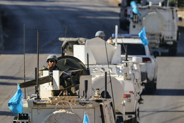 Vehicles from the United Nations Interim Force in Lebanon (UNIFIL) patrol in Marjayoun in southern Lebanon on October 12, 2024. UNIFIL, which says it has come under repeated fire in the Israeli  war against Lebanon in recent days, has patrolled the troubled border for decades (AFP photo)