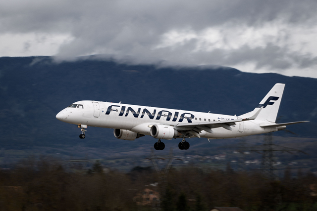In this file photo taken on March 11, 2019, an Embraer 190 commercial plane with registration OH-LKI of Nordic carrier Finnair is seen landing at Geneva Airport in Geneva (AFP photo)