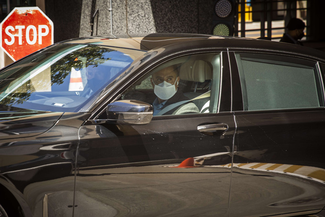Apple CEO Tim Cook (obscured), leaves court after testifying at the United States District Court on Friday, in Oakland, California (AFP file photo)