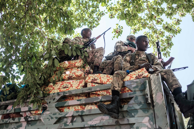 Members of the Amhara Special Forces sit on the top of a truck in the city of Alamata, Ethiopia, on December 11, 2020 (AFP photo)