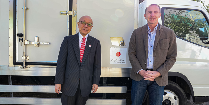 Japan’s Ambassador to Jordan Okuyama Jiro and DAA Director General Samer Balkar during the handover ceremony of  refrigerated trucks on Sunday (Photo courtesy of Japanese embassy)