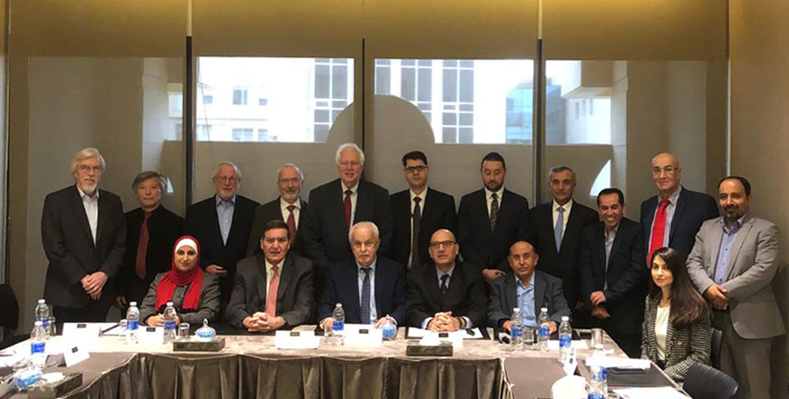 International Advisory Group members pose for a group photo during its fourth meeting (Photo courtesy of IAG)